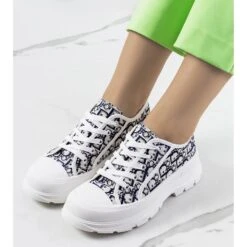 Baskets Blanches Sur La Plateforme Valida Bleu Marin