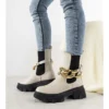 Bottes Beiges Avec Chaîne Attention